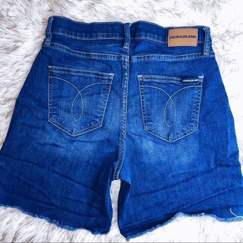 Calvin Klein High Rise Raw Hem Denim Shorts - Picture 4 of 9